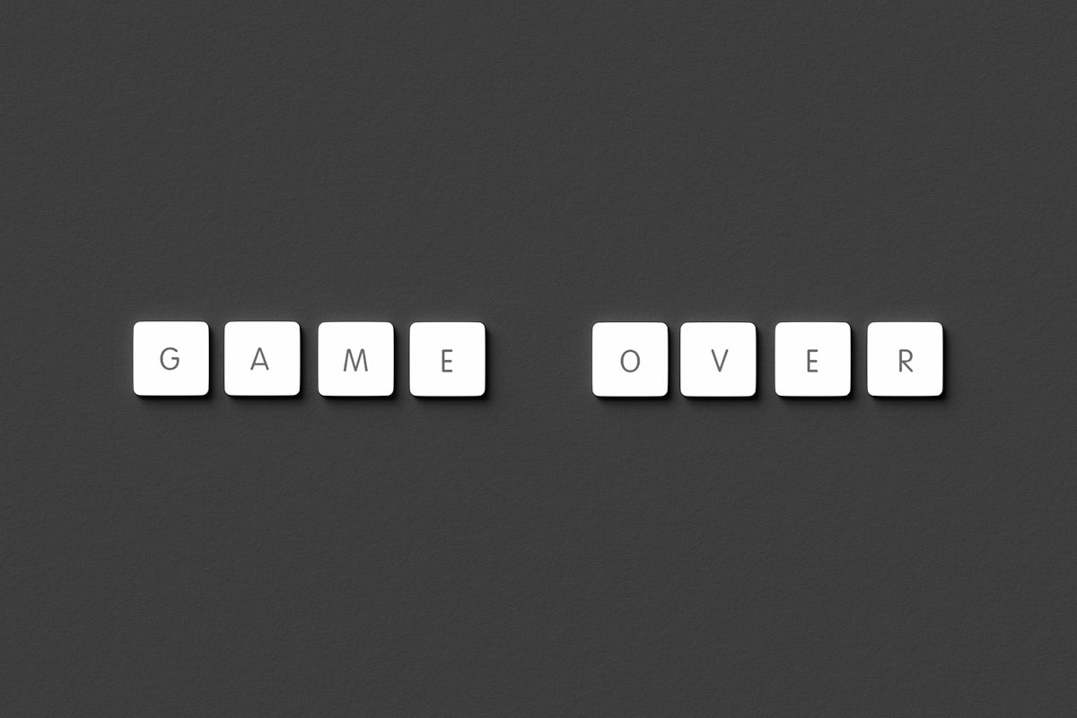 a black and white photo of the word game over